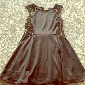 Black dress with gold sequins